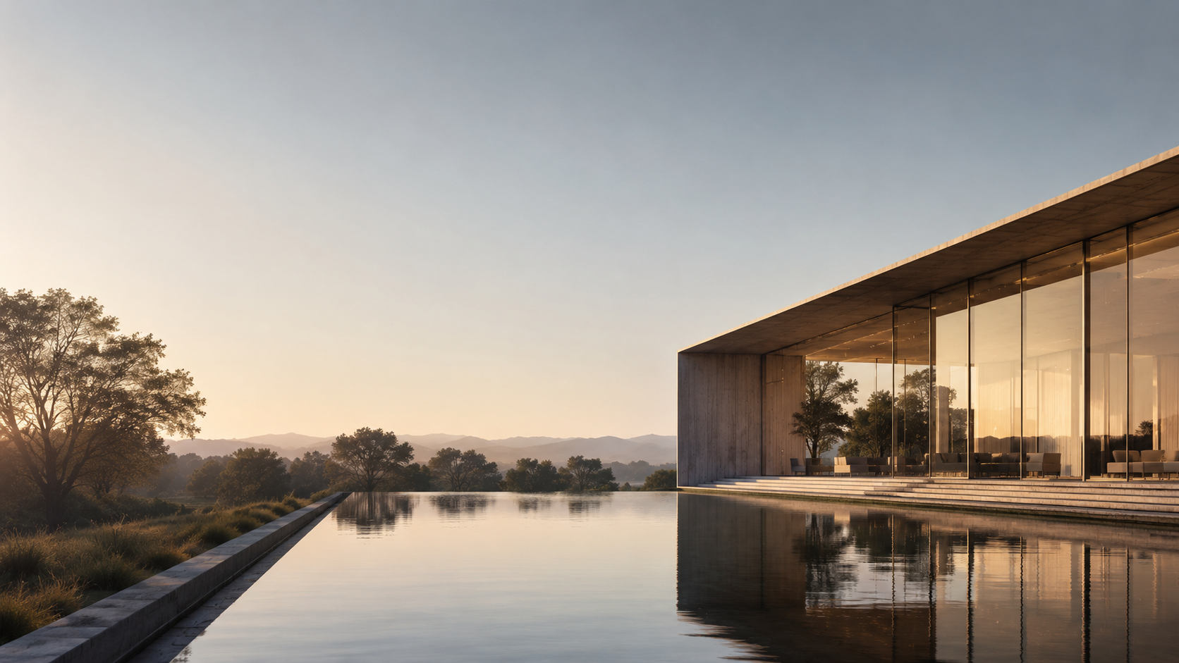 Pavillon contemporain reflété dans l'eau au crépuscule - DVA Architecture